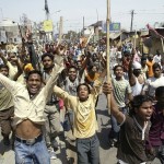 Members of the Dalit community shout slogans during a protest in Amritsar