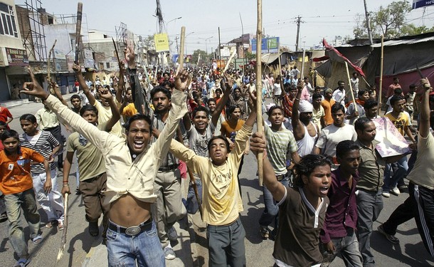 Members of the Dalit community shout slogans during a protest in Amritsar